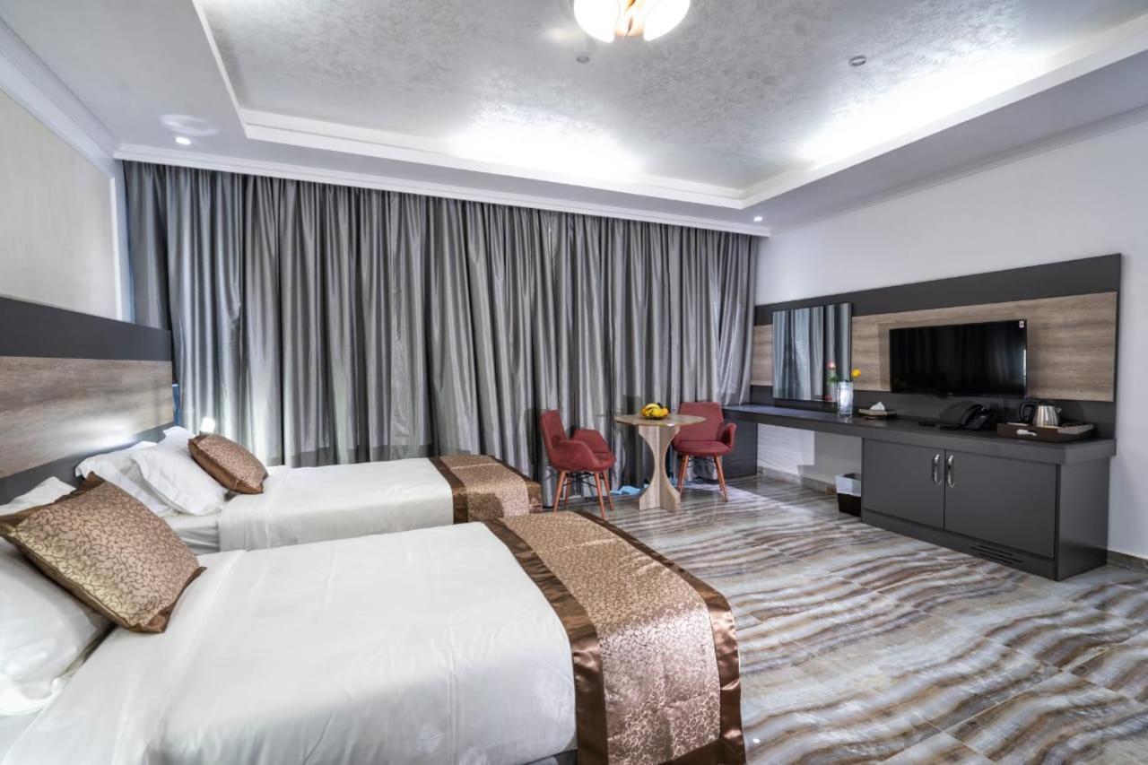 Al Amerat Hotel Al Amarat Esterno foto